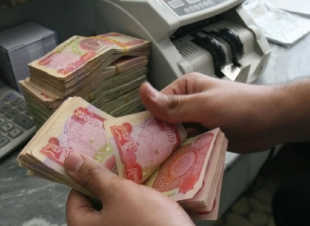 العمل: صرف تريليون و180 مليار دينار كمنح طلابية